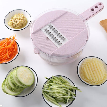 Pink 8-in-1 mandoline slicer displayed with sliced zucchini, shredded carrots, and grated vegetables