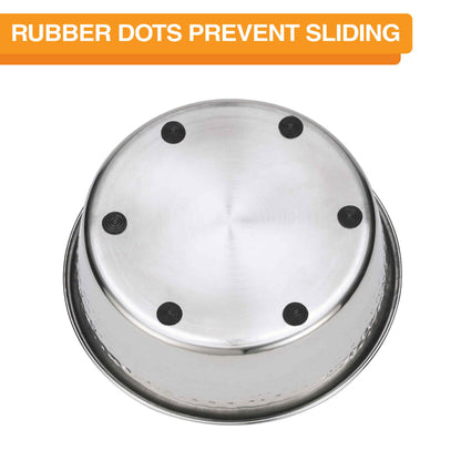 Bottom view of the Hammered Stainless Steel Bowl showing the 6 rubber dots. Text on screen reads: Rubber dots prevent sliding.
