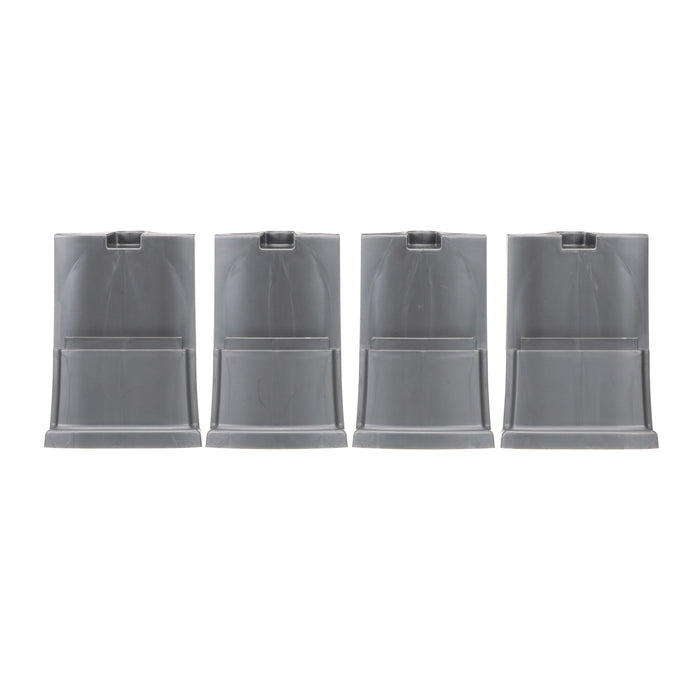 Four gunmetal gray large leg extensions  in a line on a white background.