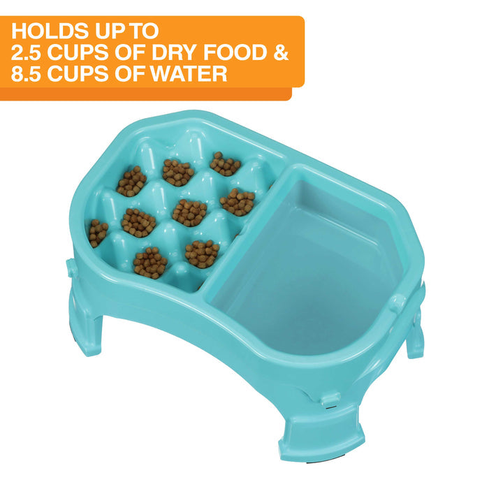 Neater Slow Feeder Double Diner with food and water inside the feeder against a white background. Text on the screen explains the food and water capacity.