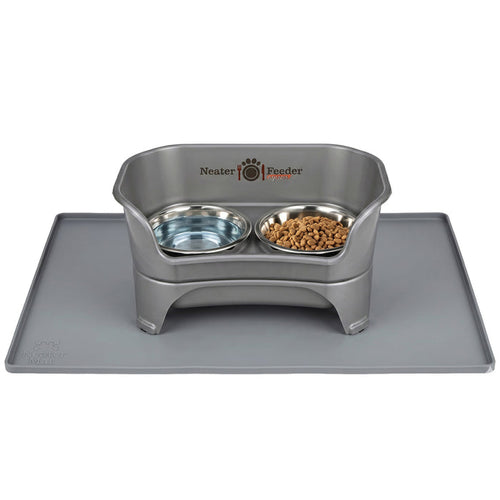 Gray Neater Feeder Express elevated pet bowl set with stainless steel food and water bowls, shown on a matching gray Neater Mat.